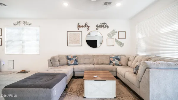 a living room with furniture and a couch