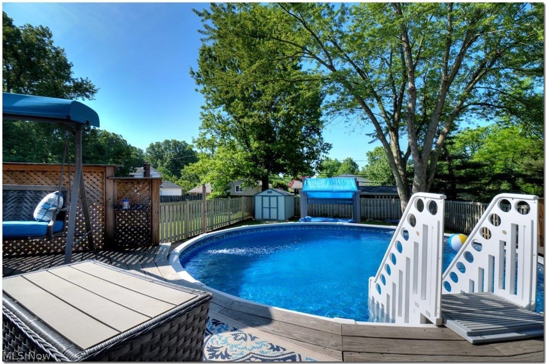 4660 Liberty Road South Euclid, OH 44121 - Photo 33 of 35 Fabulous above ground pool in this fenced-in yard, with wonderful screened porch and two-tiered deck!