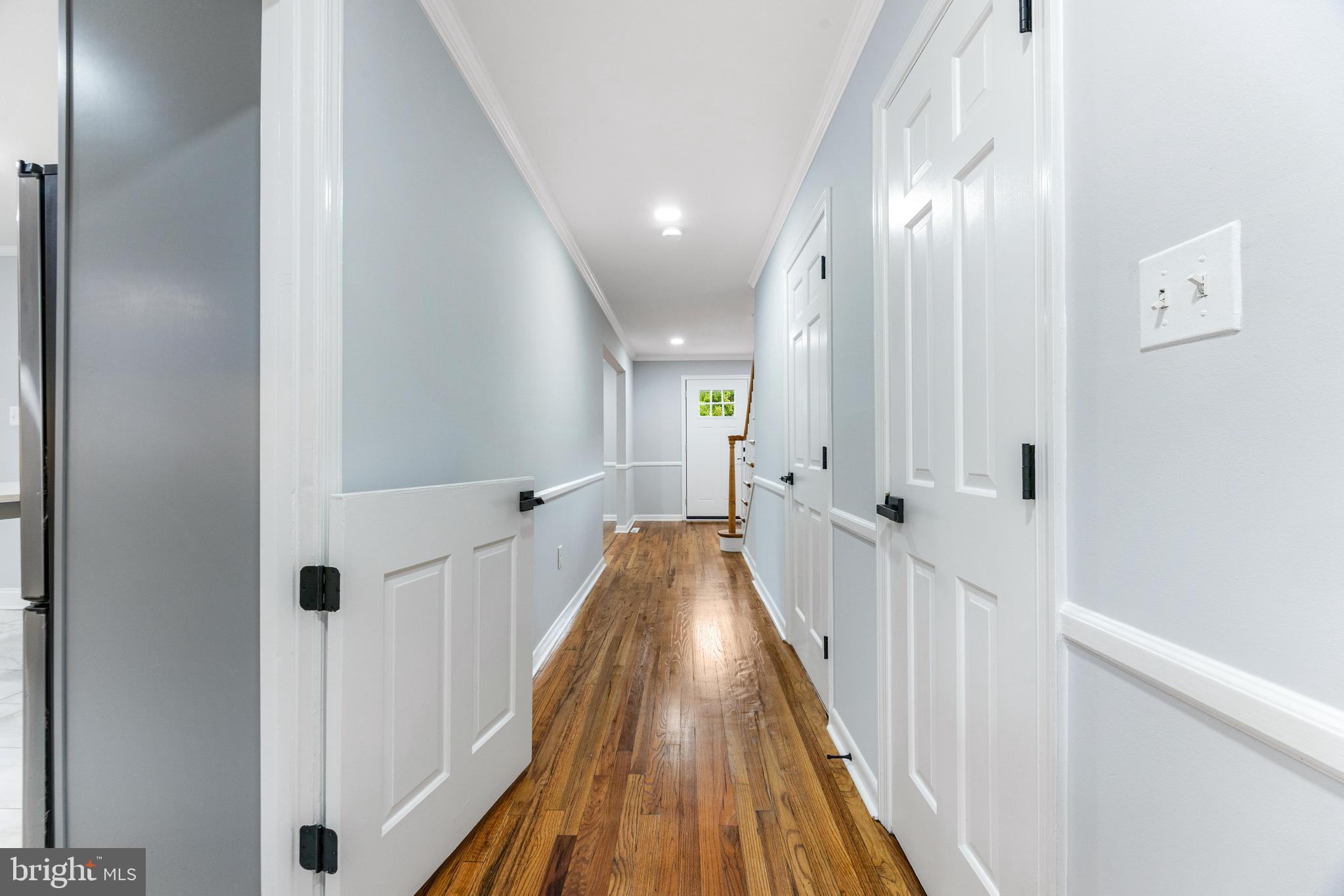 1807 Thornton Ridge Road Baltimore, MD 21204 - Photo 23 of 57 a view of a hallway with wooden floor