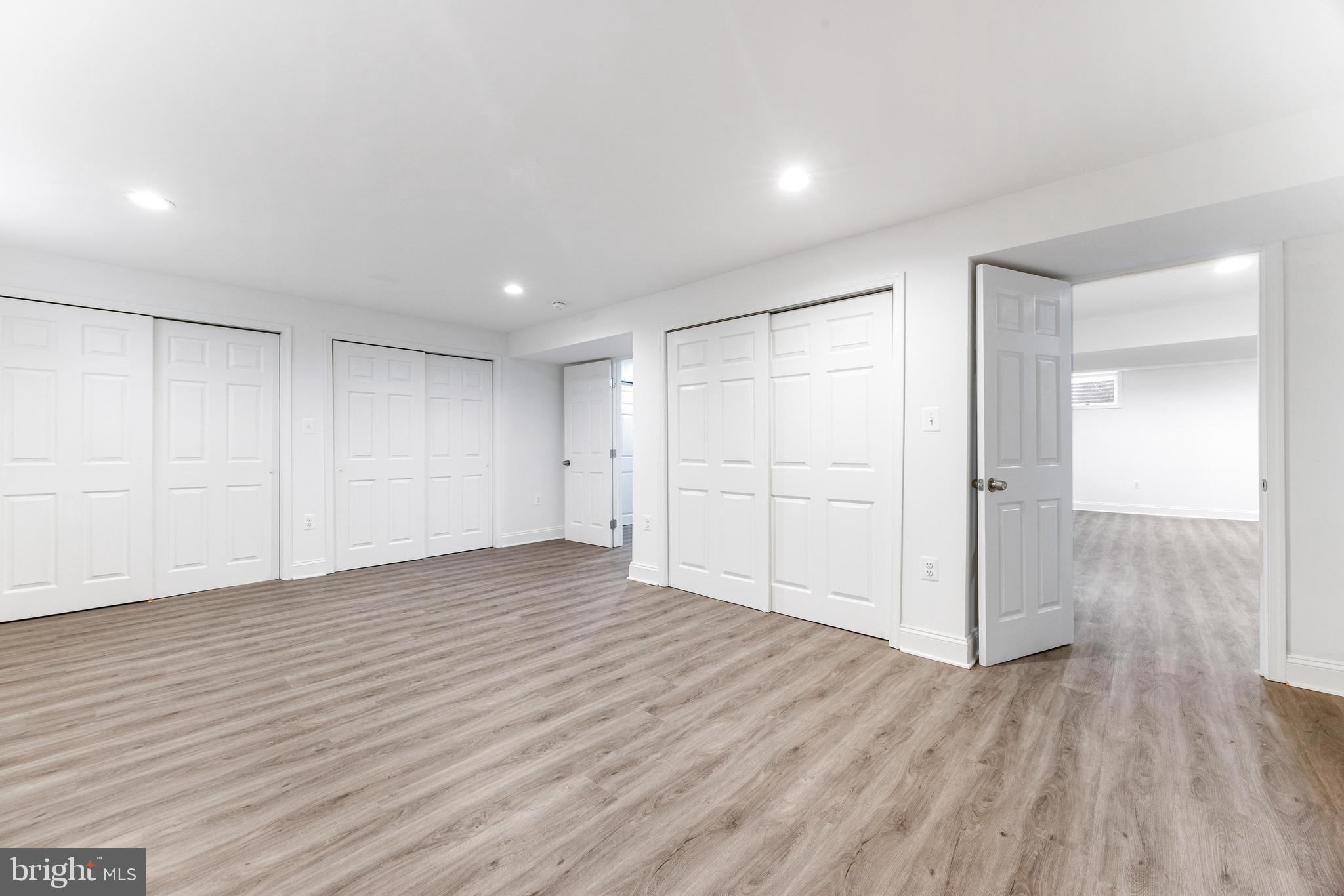 1807 Thornton Ridge Road Baltimore, MD 21204 - Photo 39 of 57 a view of empty room with wooden floor