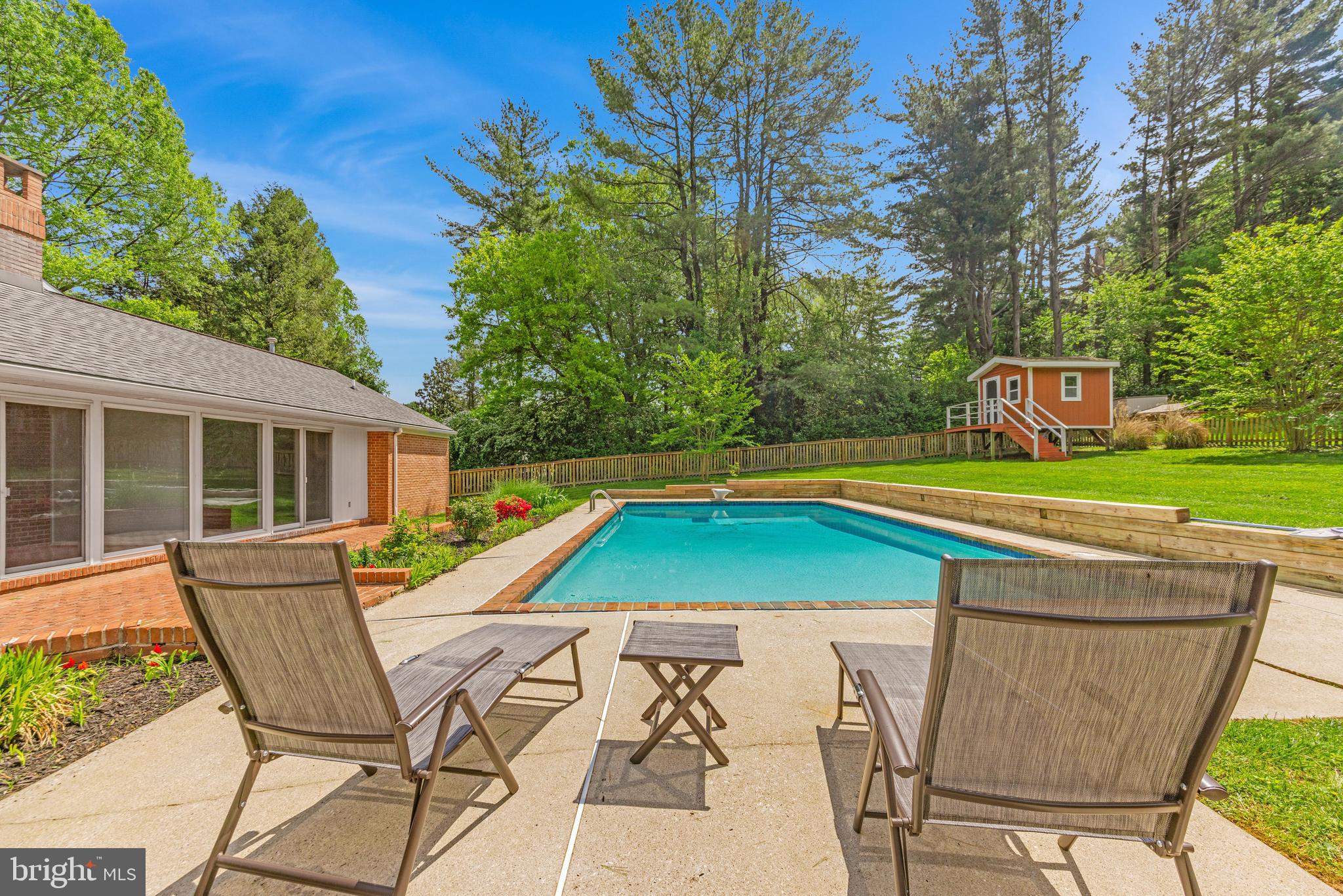 1807 Thornton Ridge Road Baltimore, MD 21204 - Photo 45 of 57 a view of pool with lawn chairs and a yard