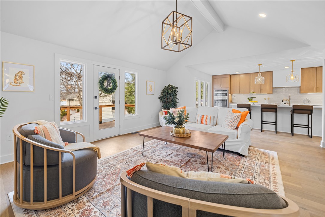 117 Riverpoint Drive Clemson, SC 29631 - Photo 10 of 47 This bright and open-concept living space features high ceilings and elegant hardwood flooring.