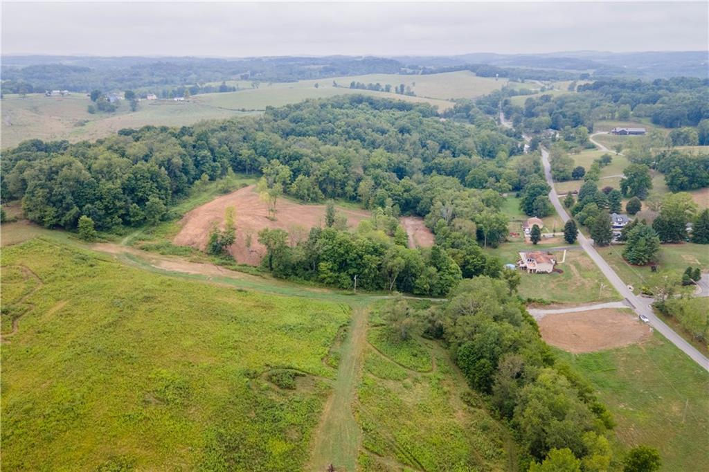0 Cumer Road McDonald, PA 15057 - Photo 5 of 28 a view of a lake with a yard