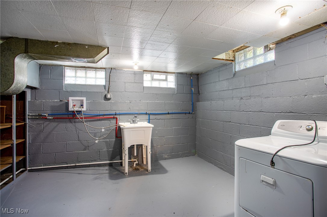 12028 Triskett Road Cleveland, OH 44111 - Photo 23 of 23 Below grade area featuring washer / dryer