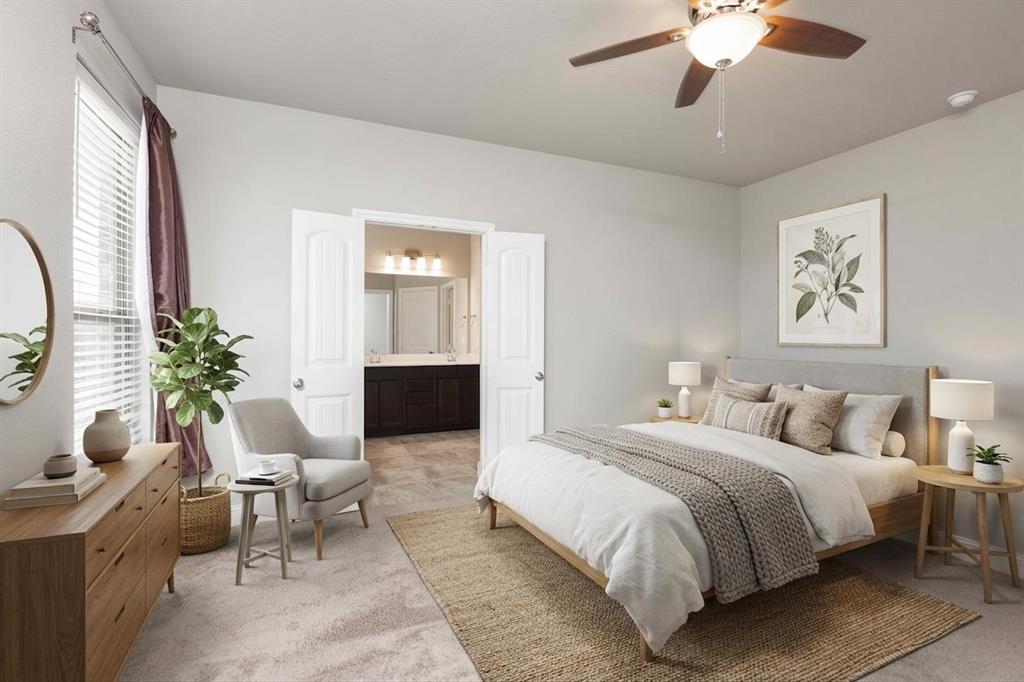 a bedroom with a balcony a bed and a potted plant on a dresser
