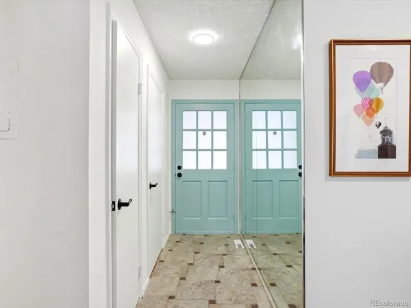 wooden floor with a bathroom