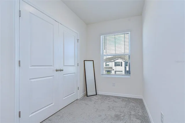 a view of bedroom with furniture