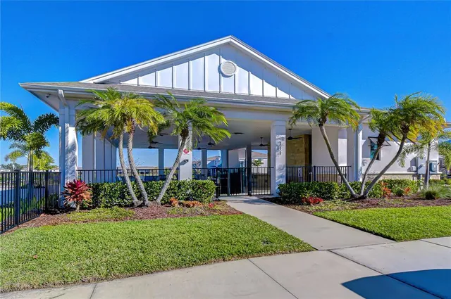 a view of a livingroom with furniture and a window