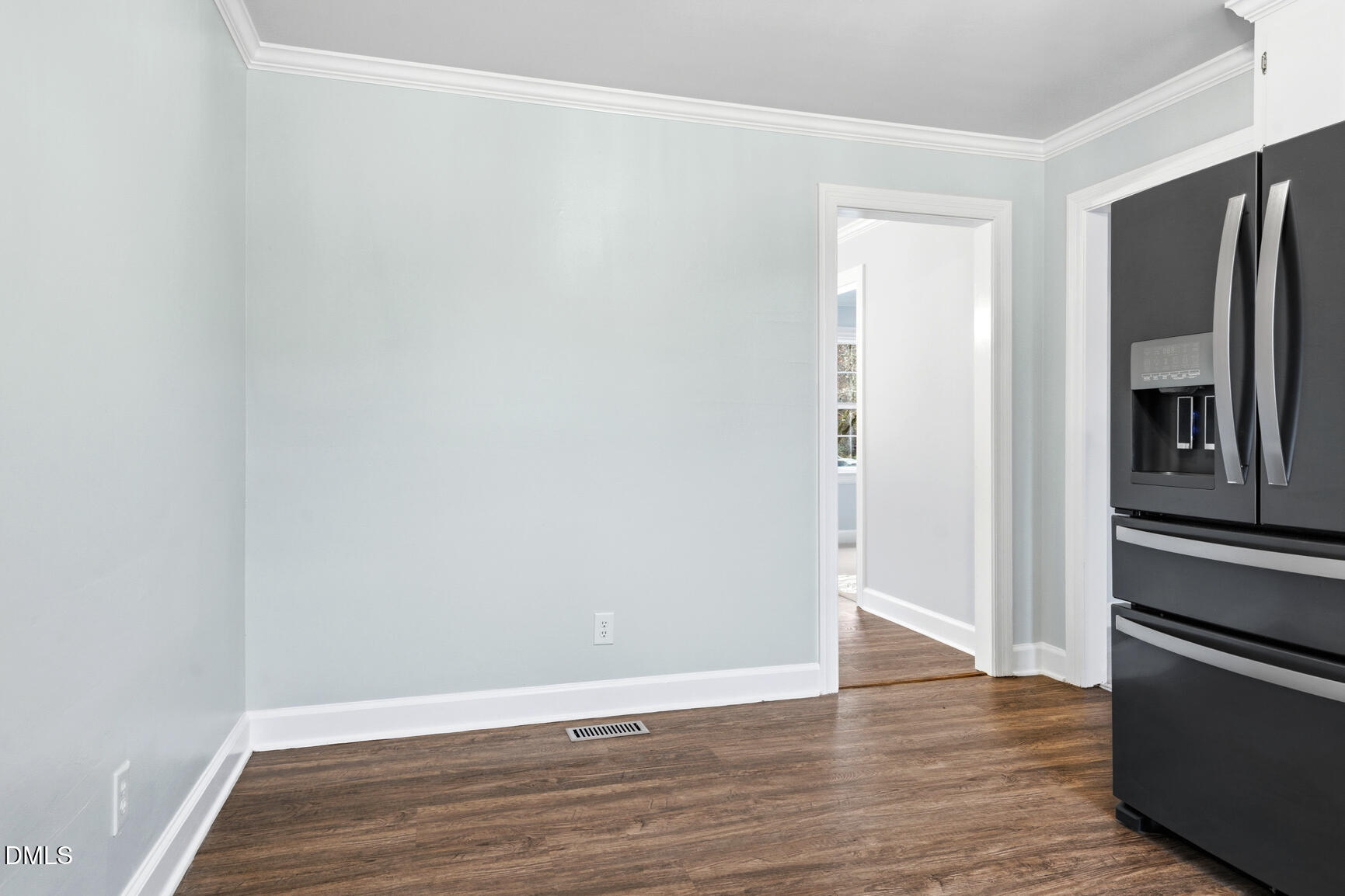 4712 Crest Road Wilson, NC 27893 - Photo 13 of 31 a view of an empty room with wooden floor and a window