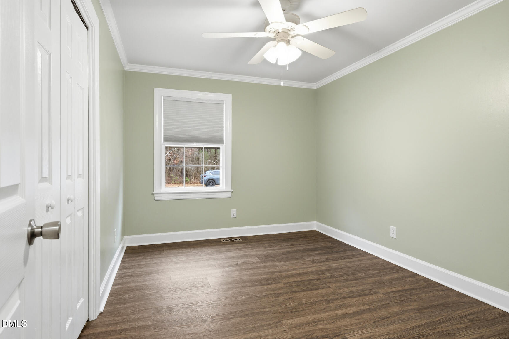 4712 Crest Road Wilson, NC 27893 - Photo 17 of 31 wooden floor in an empty room with a window