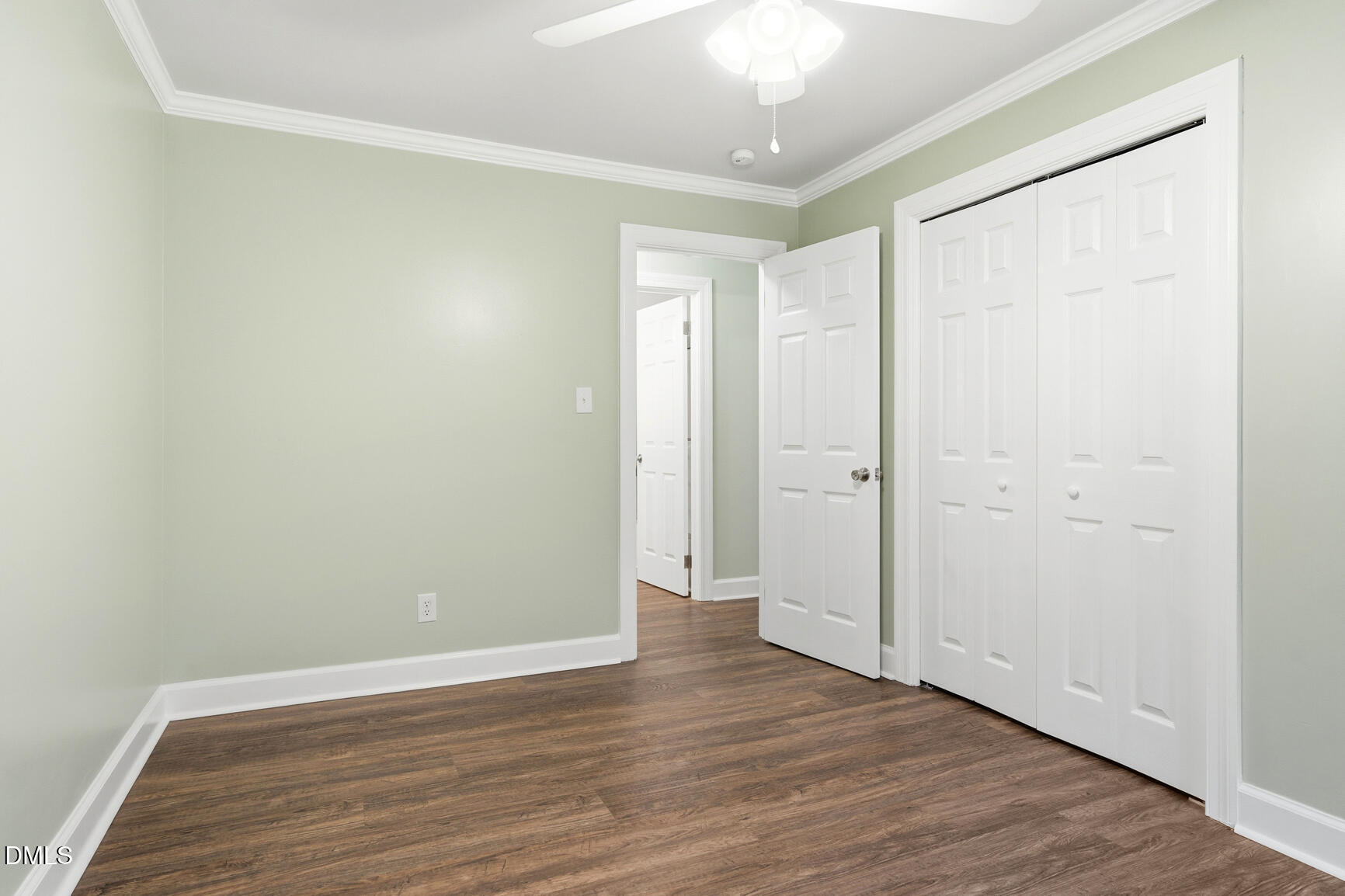 4712 Crest Road Wilson, NC 27893 - Photo 18 of 31 a view of an empty room with wooden floor