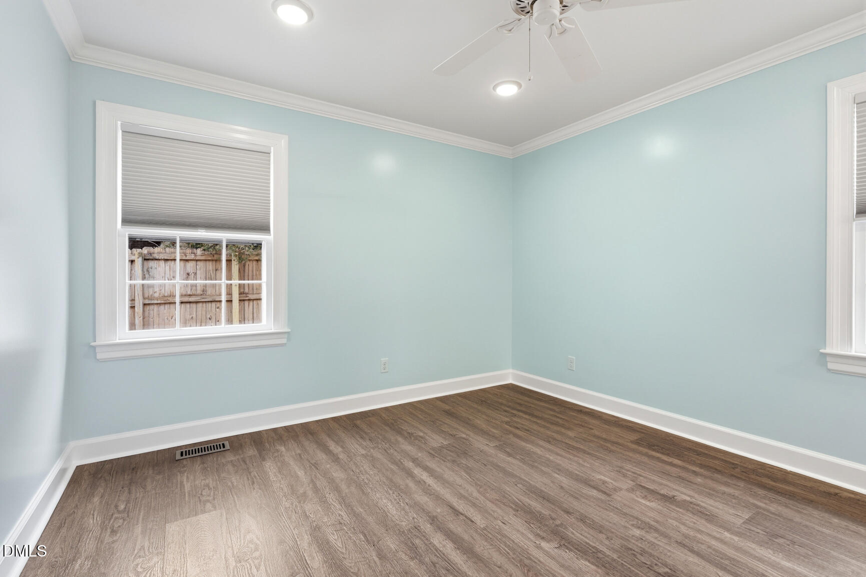 4712 Crest Road Wilson, NC 27893 - Photo 23 of 31 a view of a room with wooden floor and windows