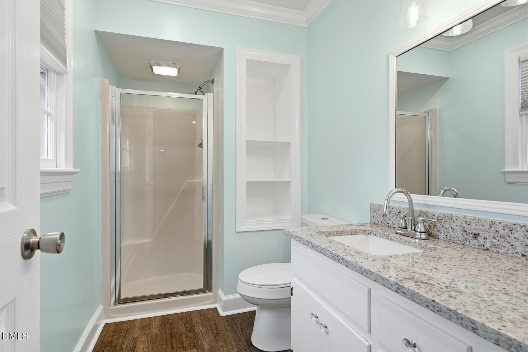 4712 Crest Road Wilson, NC 27893 - Photo 26 of 31 a bathroom with a granite countertop sink toilet and shower