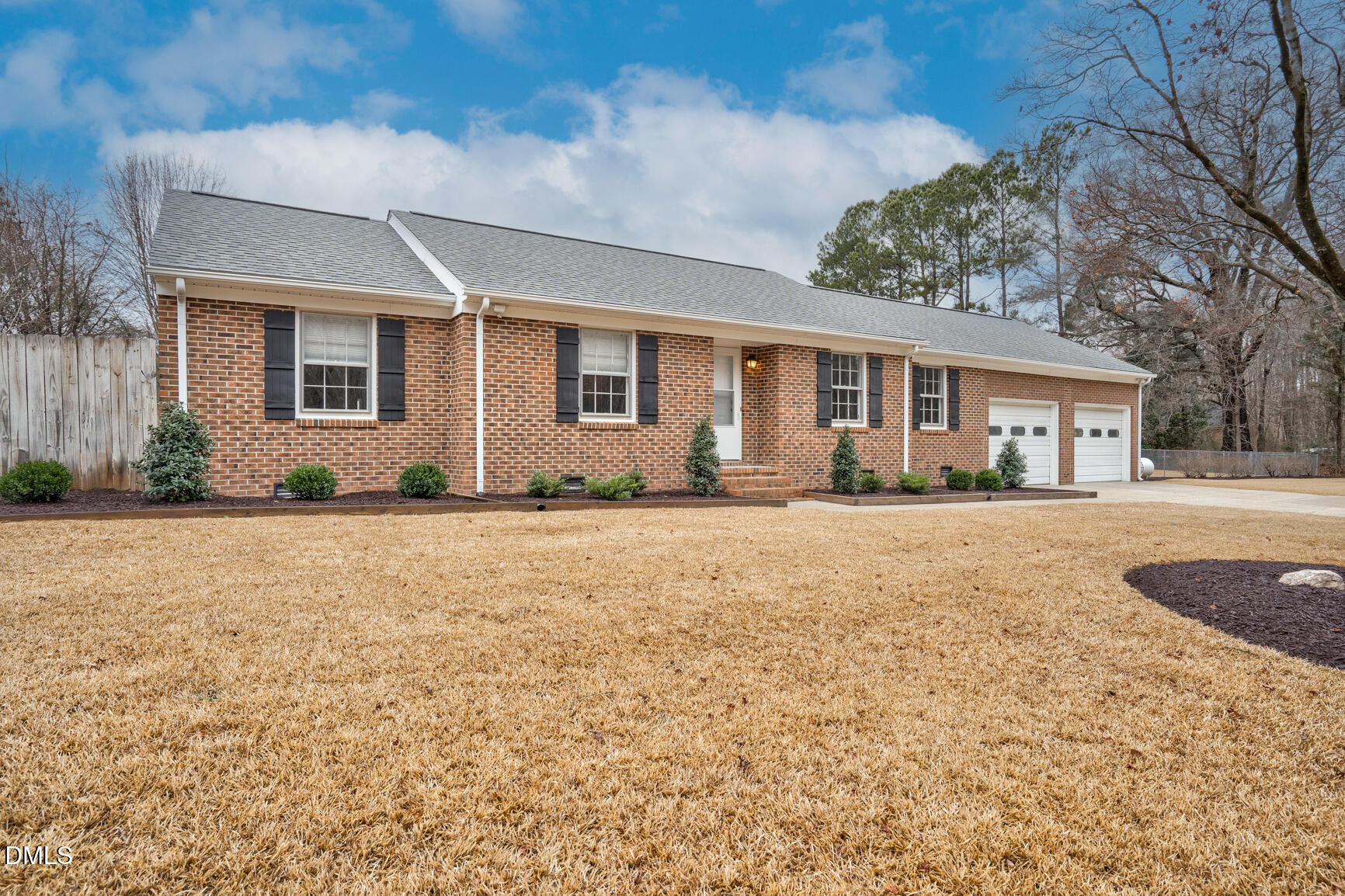 4712 Crest Road Wilson, NC 27893 - Photo 3 of 31 a front view of house with yard and trees around