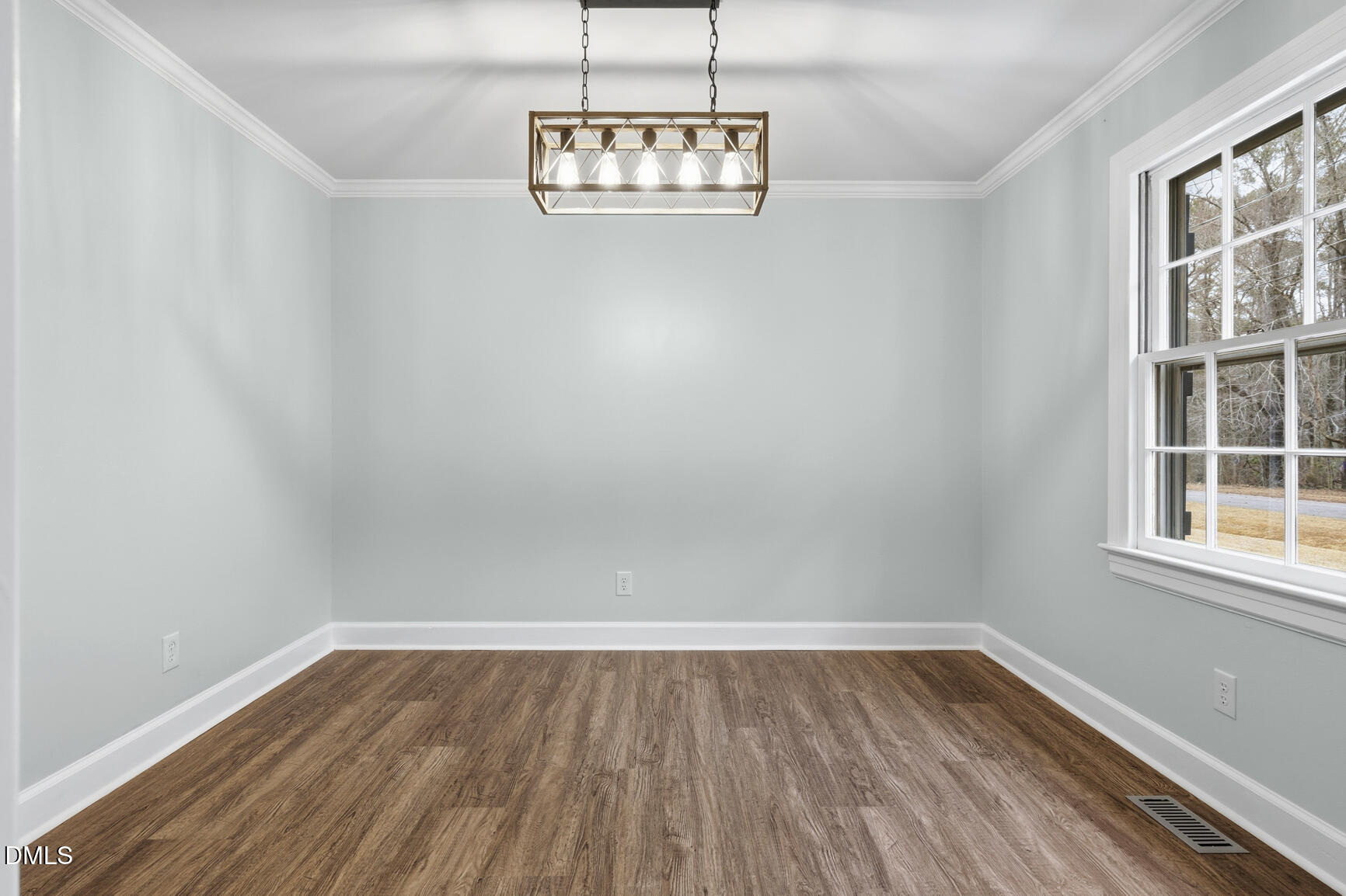 4712 Crest Road Wilson, NC 27893 - Photo 7 of 31 wooden floor in an empty room with a window