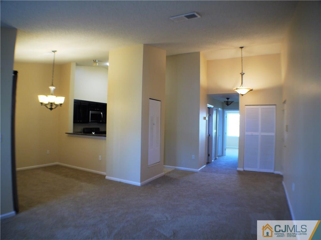 936 Edpas Road, Unit 936 New Brunswick, NJ 08901 - Photo 2 of 21 a view of a hallway with bathroom