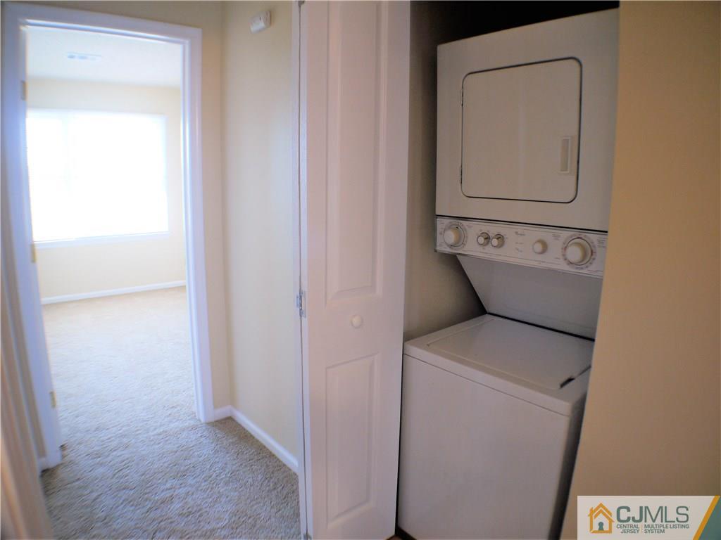 936 Edpas Road, Unit 936 New Brunswick, NJ 08901 - Photo 15 of 21 a utility room with dryer and washer