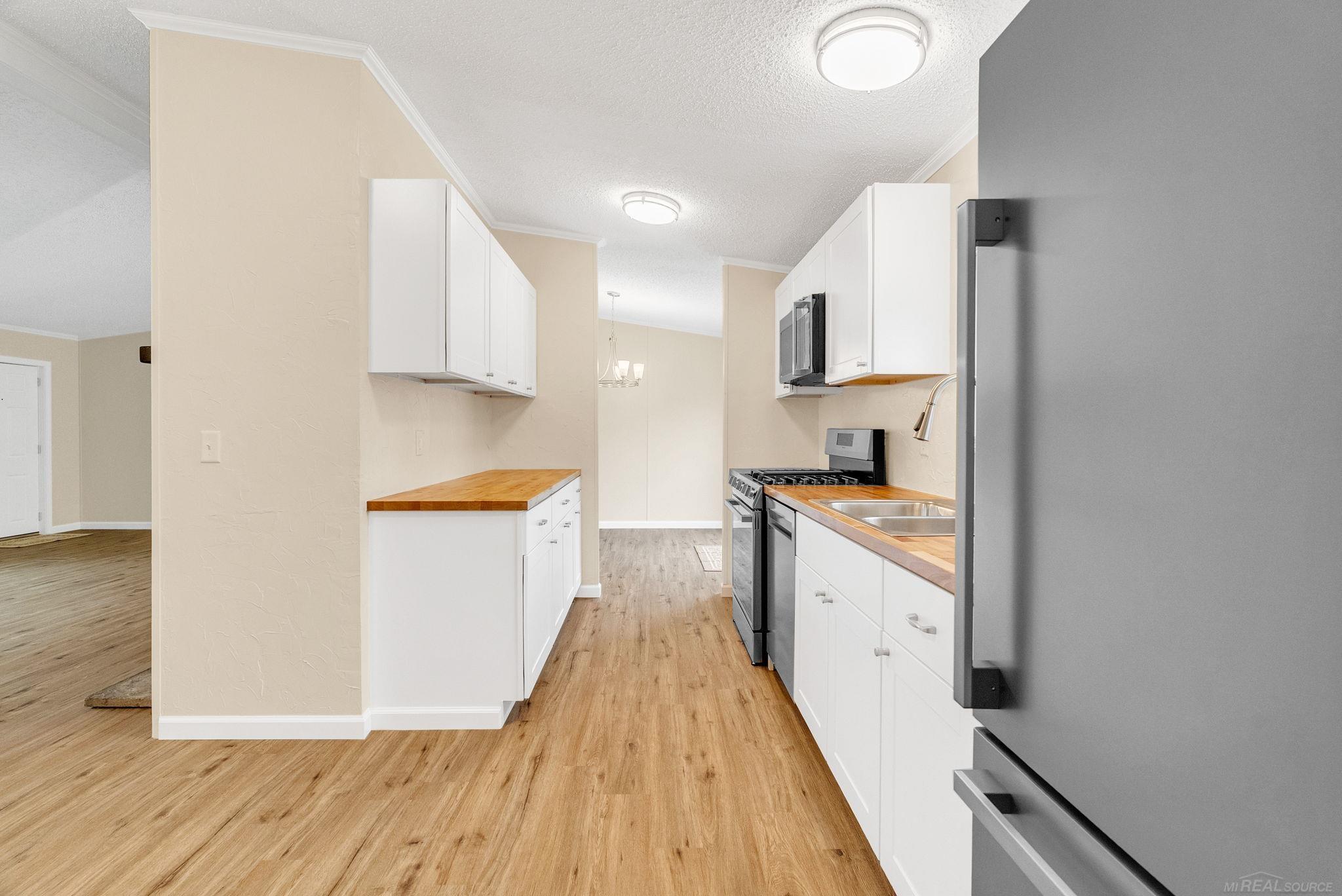 2100 Rowe Road Applegate, MI 48401 - Photo 5 of 46 50175995-29d609cb-5709-4b51-bea3-daca228eb536.JPG