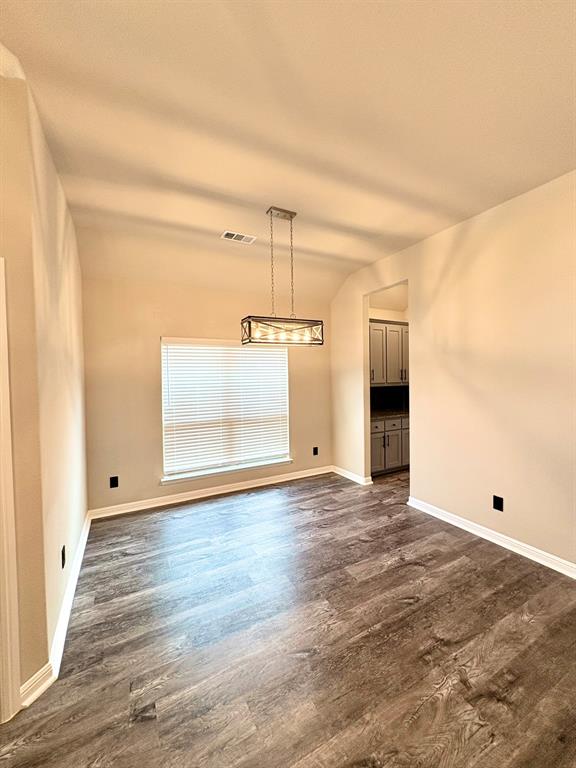 293 Cisco Trail Forney, TX 75126 - Photo 15 of 19 a view of empty room with wooden floor