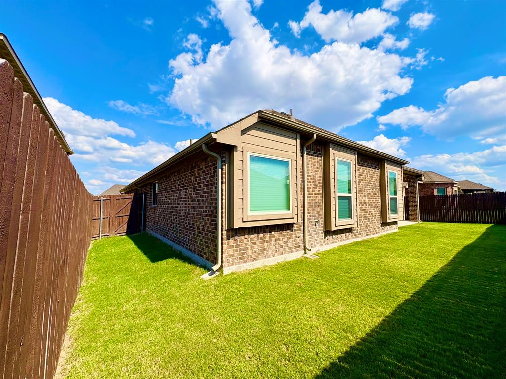 293 Cisco Trail Forney, TX 75126 - Photo 17 of 19 a house view with a garden space