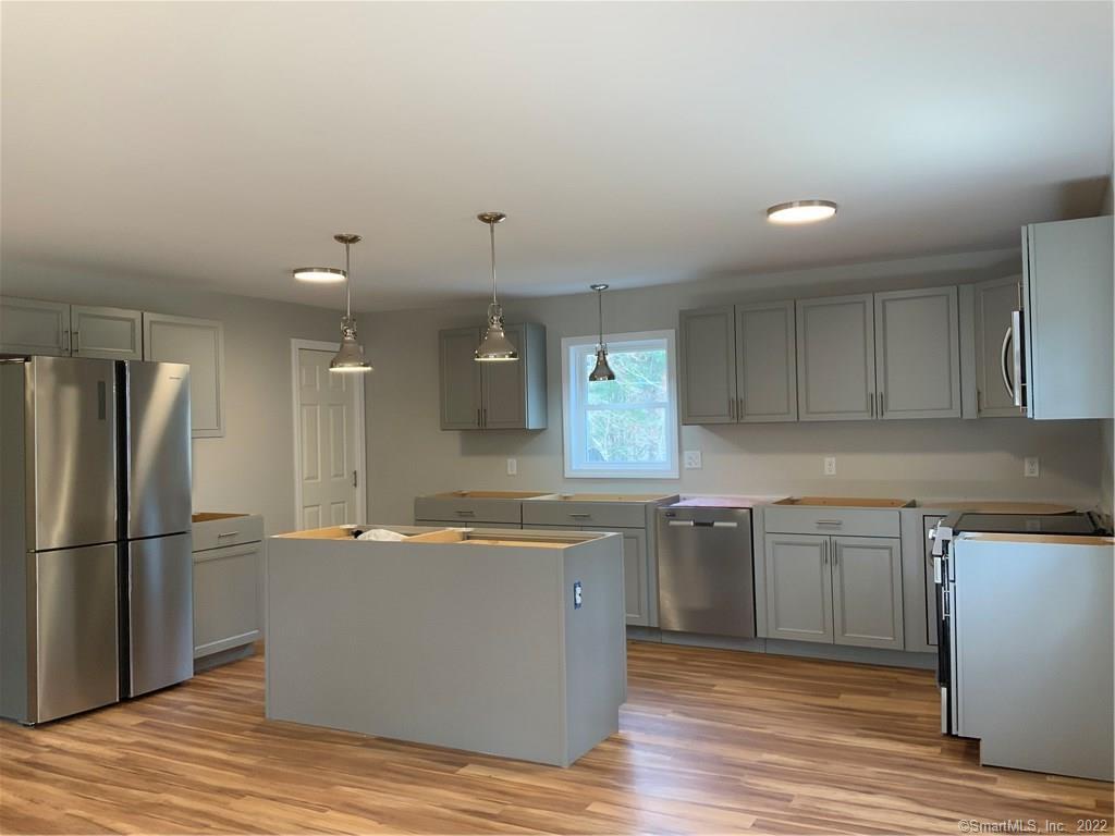 249 Snake Meadow Road Killingly, CT 06239 - Photo 1 of 1 a view of a kitchen with electric appliances