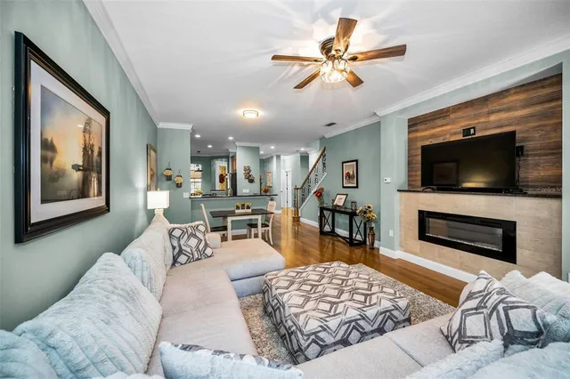 a view of a dining room with furniture and window