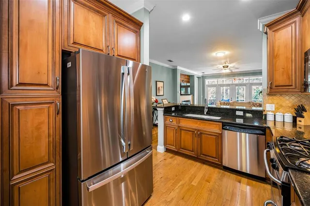 a bedroom with a bed and a dresser in it
