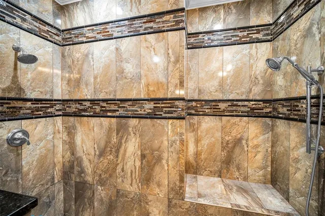 a view of a livingroom with furniture and a flat screen tv