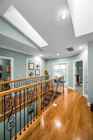 a bed room with a bed and a ceiling fan