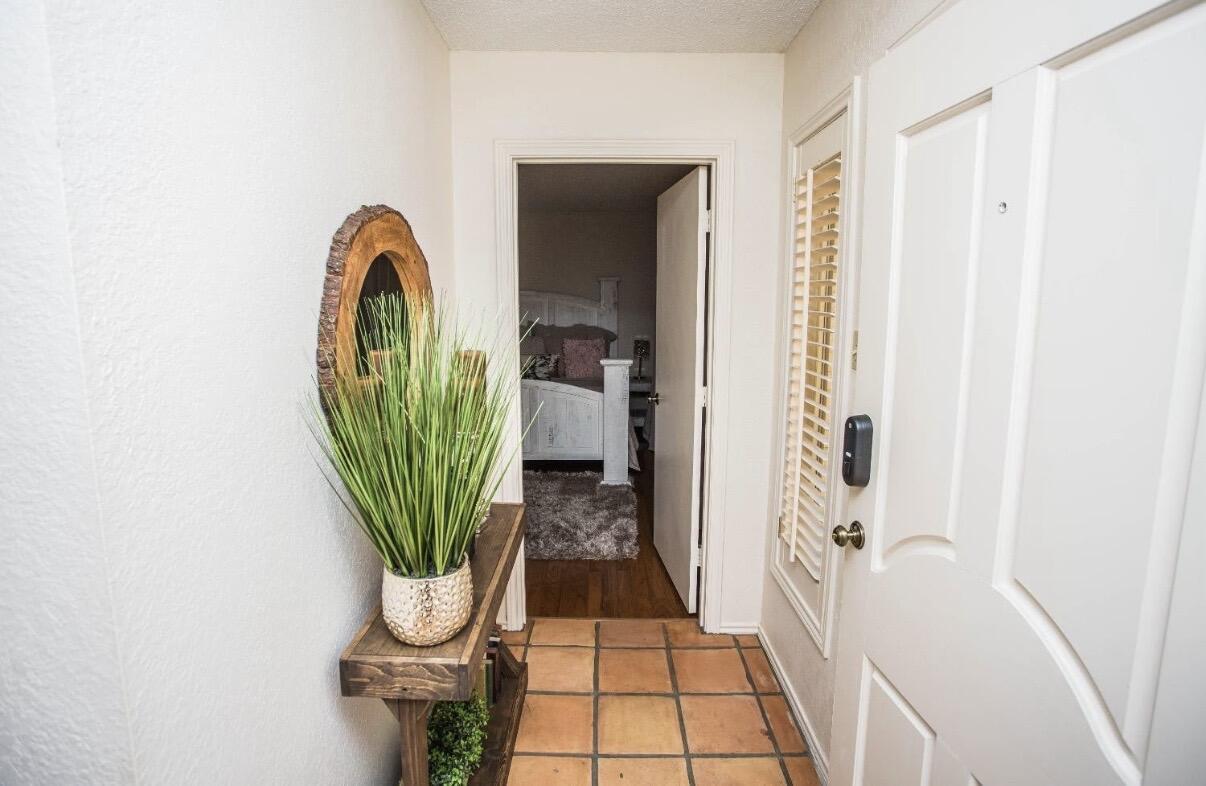 5202 20th Street Lubbock, TX 79407 - Photo 15 of 45 a view of a bathroom with mirror