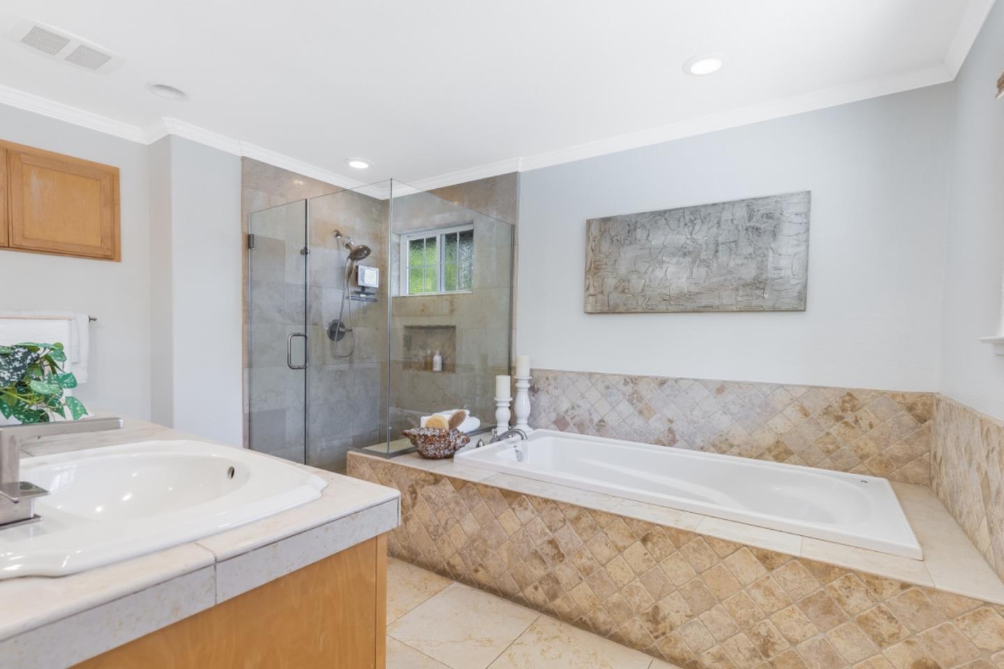 102 Old Orchard Drive Los Gatos, CA 95032 - Photo 18 of 33 a spacious bathroom with a tub sink and mirror