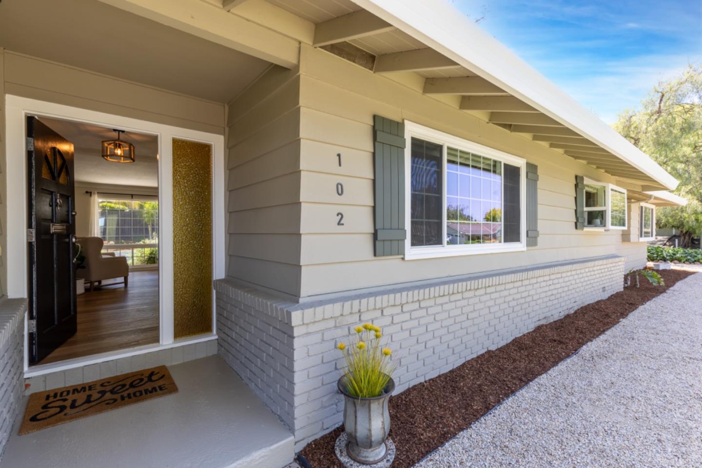 102 Old Orchard Drive Los Gatos, CA 95032 - Photo 3 of 33 a front view of a house with large windows