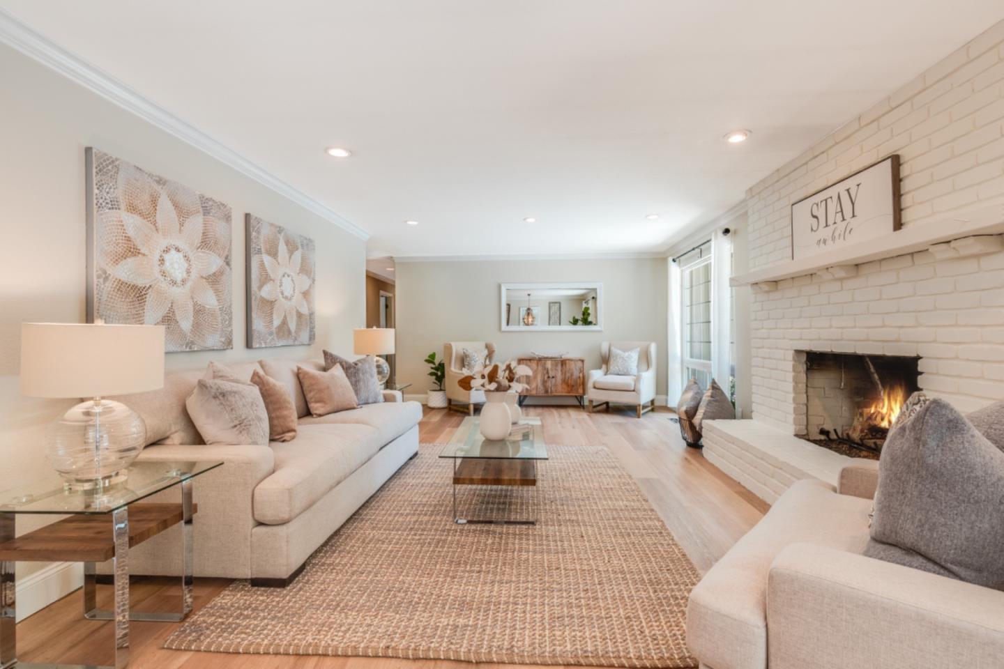 102 Old Orchard Drive Los Gatos, CA 95032 - Photo 5 of 33 a living room with furniture and a fireplace