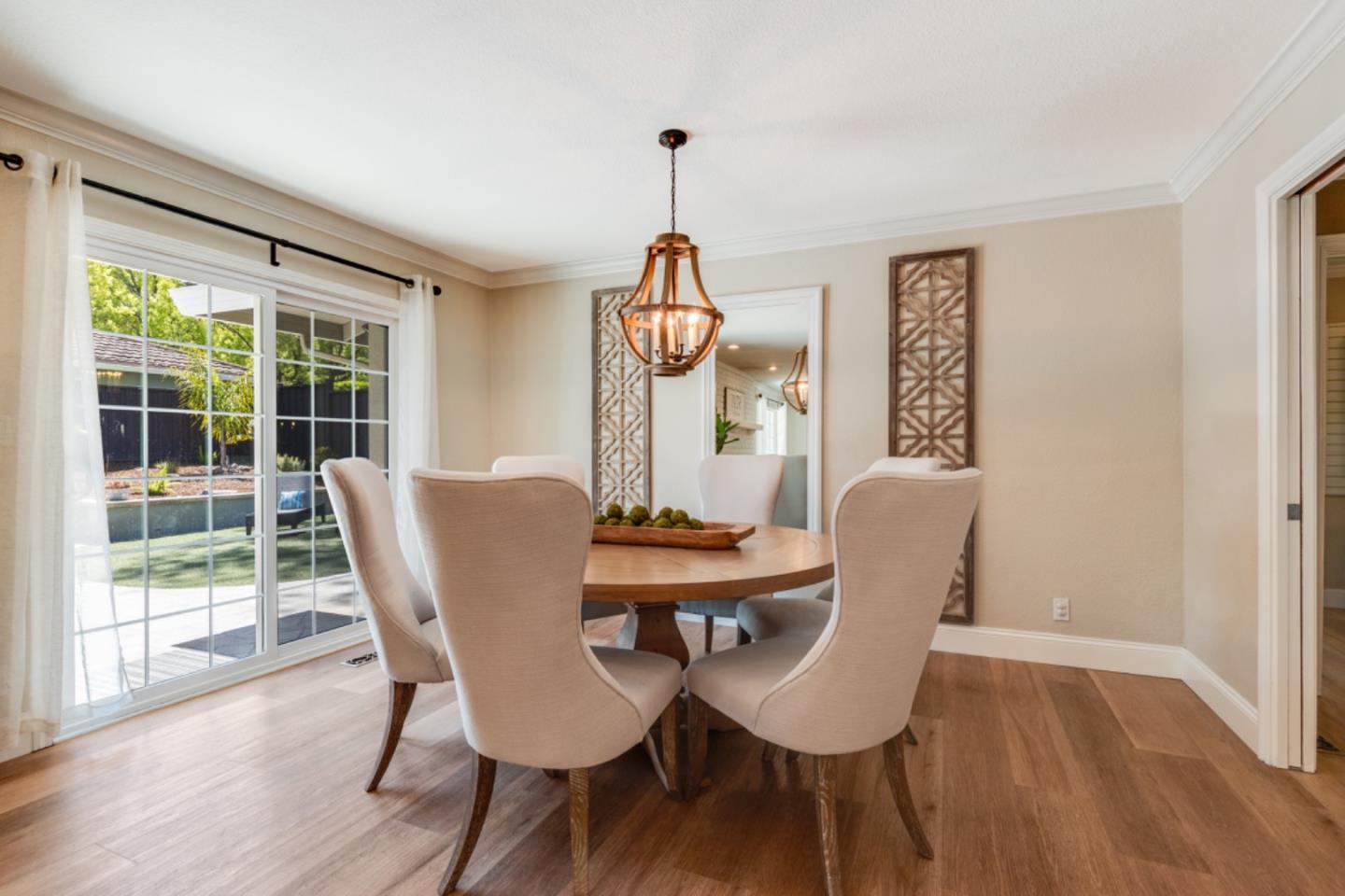 102 Old Orchard Drive Los Gatos, CA 95032 - Photo 6 of 33 a view of a dining room with furniture window and wooden floor