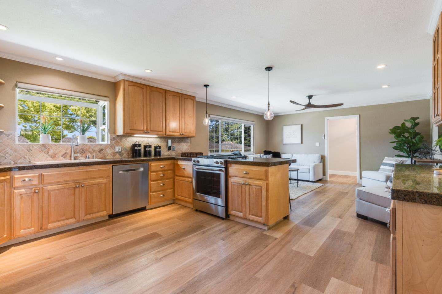 102 Old Orchard Drive Los Gatos, CA 95032 - Photo 8 of 33 a kitchen with sink a microwave and cabinets