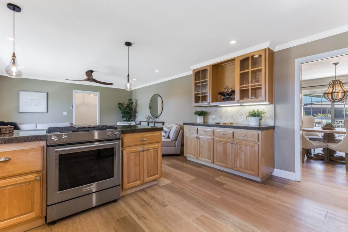 102 Old Orchard Drive Los Gatos, CA 95032 - Photo 9 of 33 a kitchen with stainless steel appliances granite countertop a stove and a sink