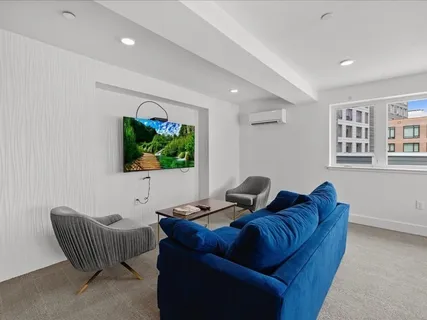 a kitchen with stainless steel appliances a refrigerator sink and cabinets