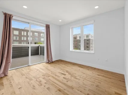 a view of a balcony with city view