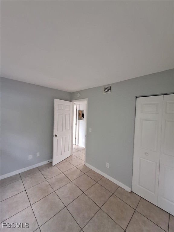 2575 Second Street Fort Myers, FL 33901 - Photo 6 of 8 a view of an empty room and window and cabinet