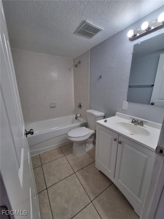2575 Second Street Fort Myers, FL 33901 - Photo 7 of 8 a bathroom with a double vanity sink toilet and shower