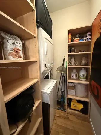 a view of storage and utility room with racks on the wall