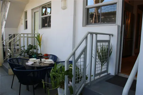 a view of a livingroom with furniture and entryway