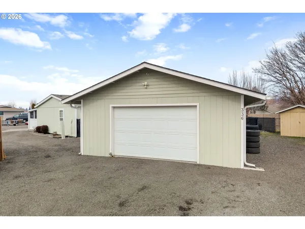 a view of a garage with a lot of stuff