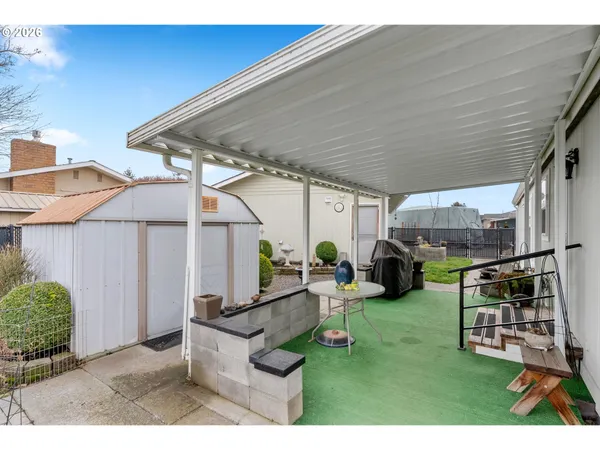 a house view with a backyard space