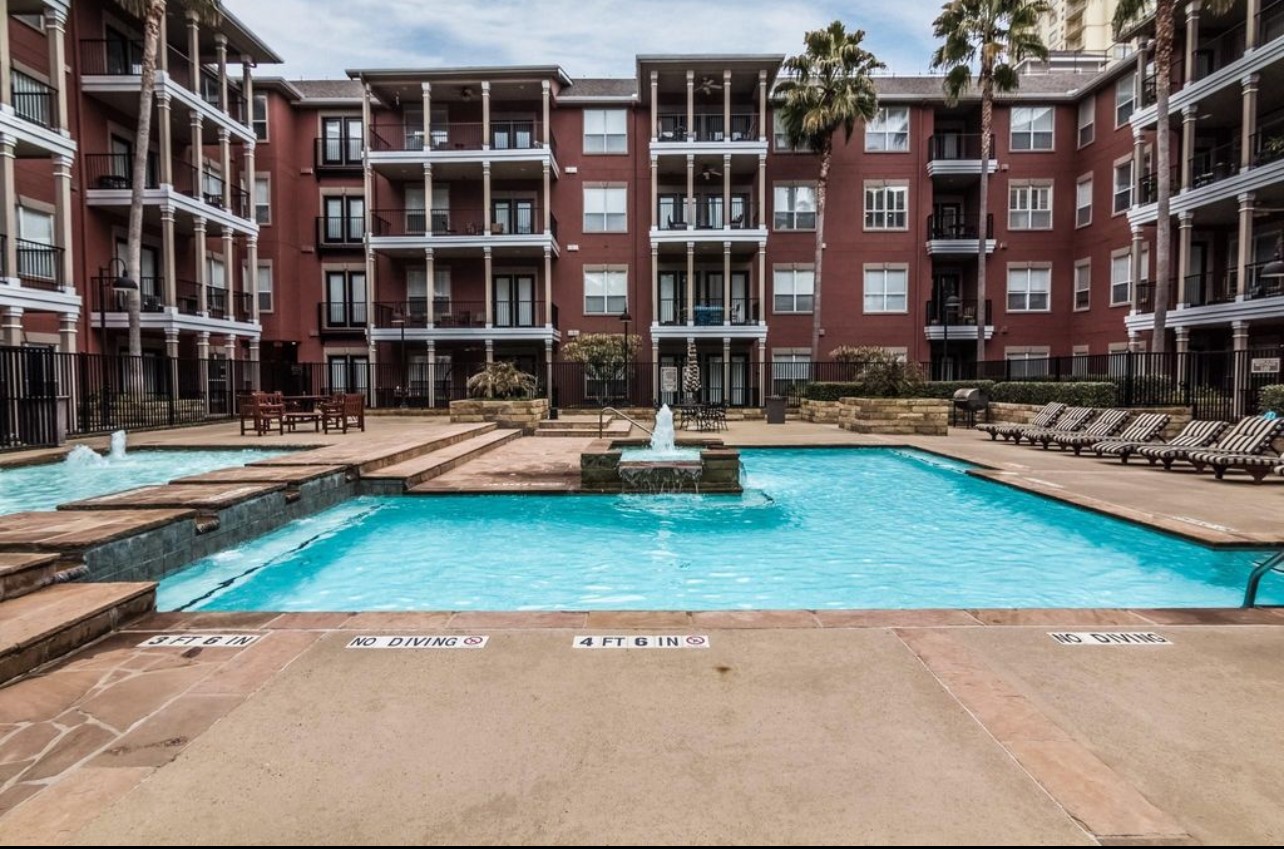 2400 McCue Road, Unit 262 Houston, TX 77056 - Photo 27 of 50 front view of house with a yard