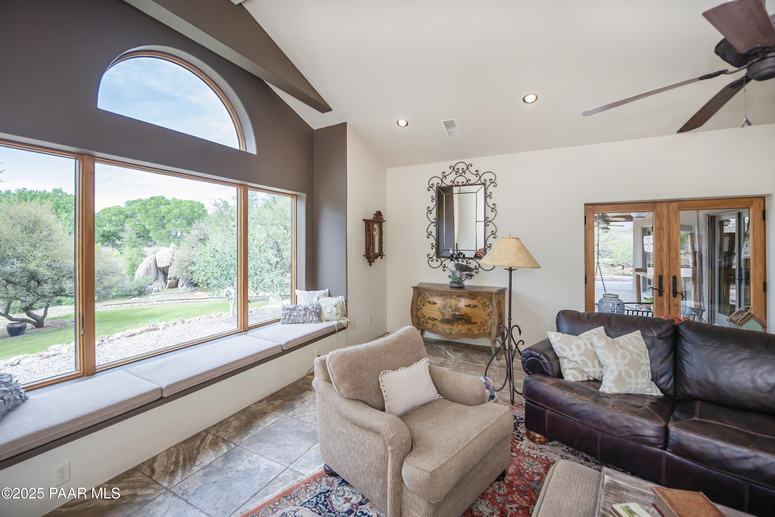 770 Grisby Road Skull Valley, AZ 86338 - Photo 18 of 58 a living room with furniture and a large window
