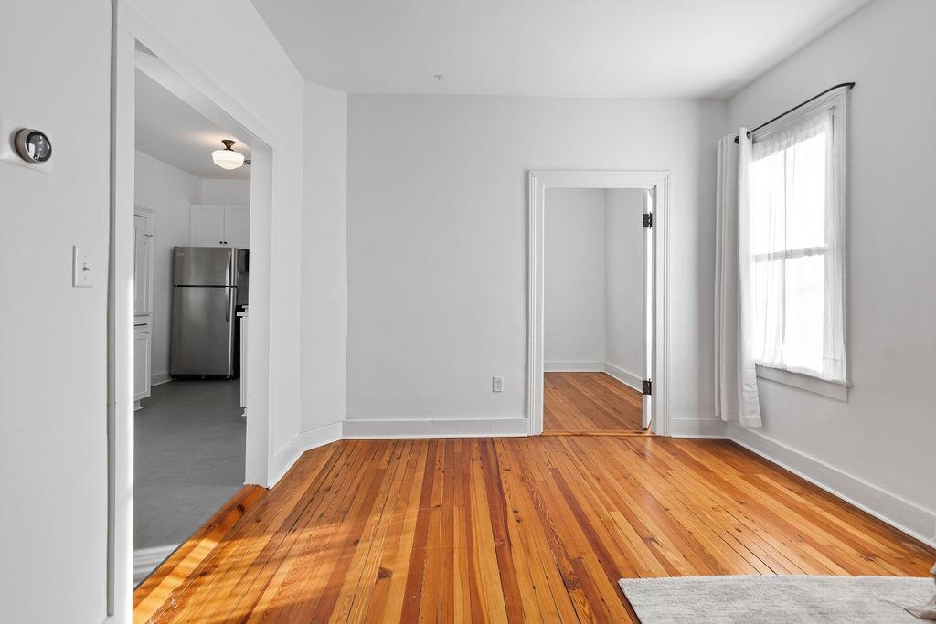 115 South Jefferson Street Staunton, VA 24401 - Photo 18 of 29 a view of a room with wooden floor and a bathroom