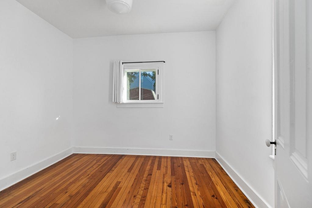 115 South Jefferson Street Staunton, VA 24401 - Photo 19 of 29 a view of a room with wooden floor and window