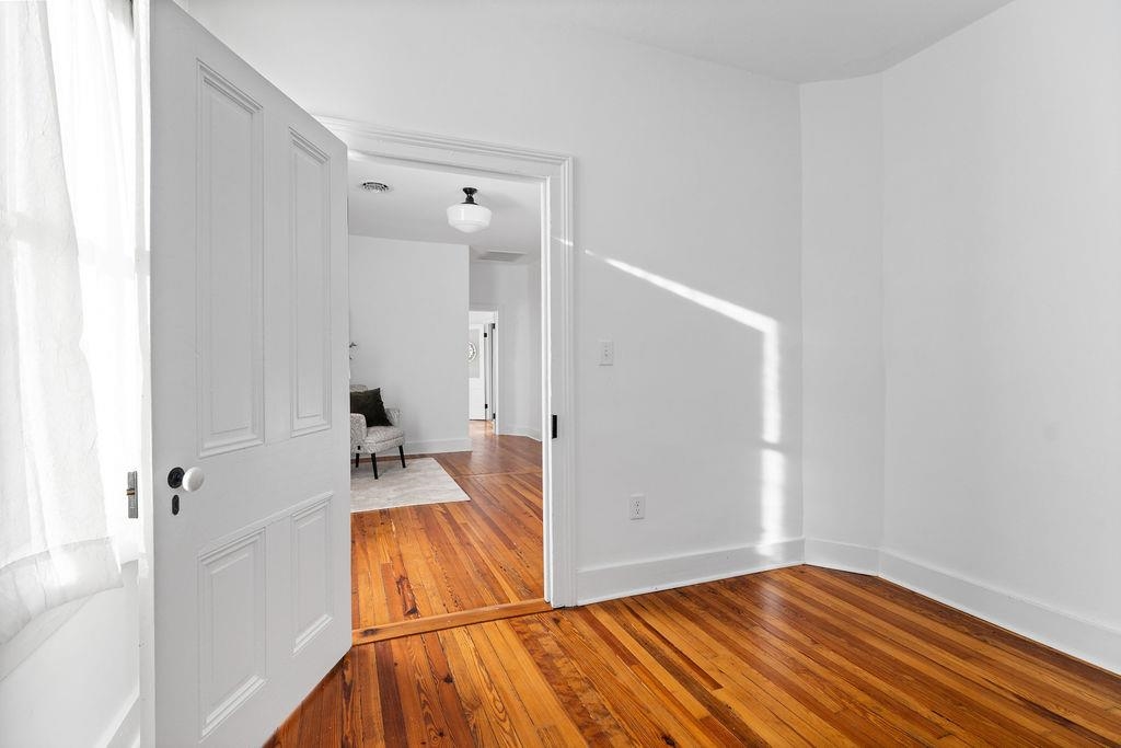 115 South Jefferson Street Staunton, VA 24401 - Photo 20 of 29 a view of walk in closet with rug