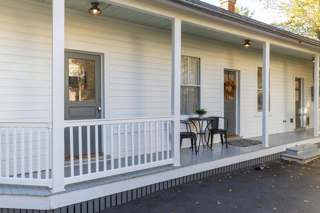 115 South Jefferson Street Staunton, VA 24401 - Photo 3 of 29 a view of a porch with a bench